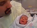 Jason holding Hayden for the first time