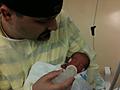 Jason feeding Harrison for the first time